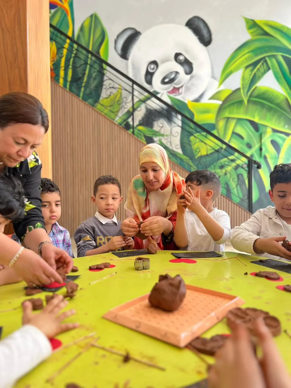 Atelier poterie avec les parents